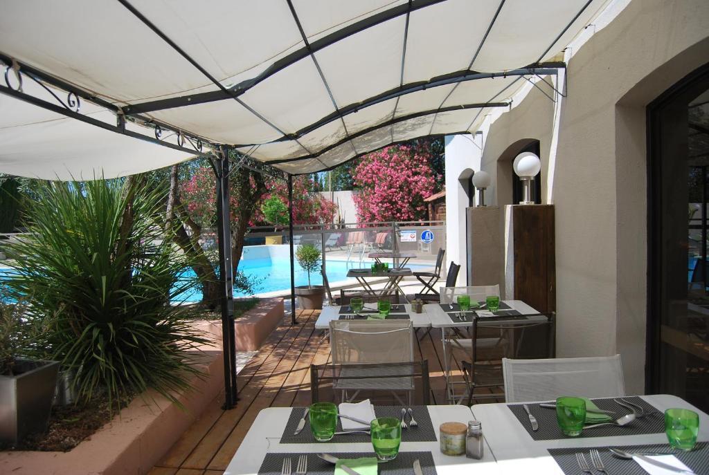 Logis Hotel Restaurant Les Aubuns Caissargues Εξωτερικό φωτογραφία